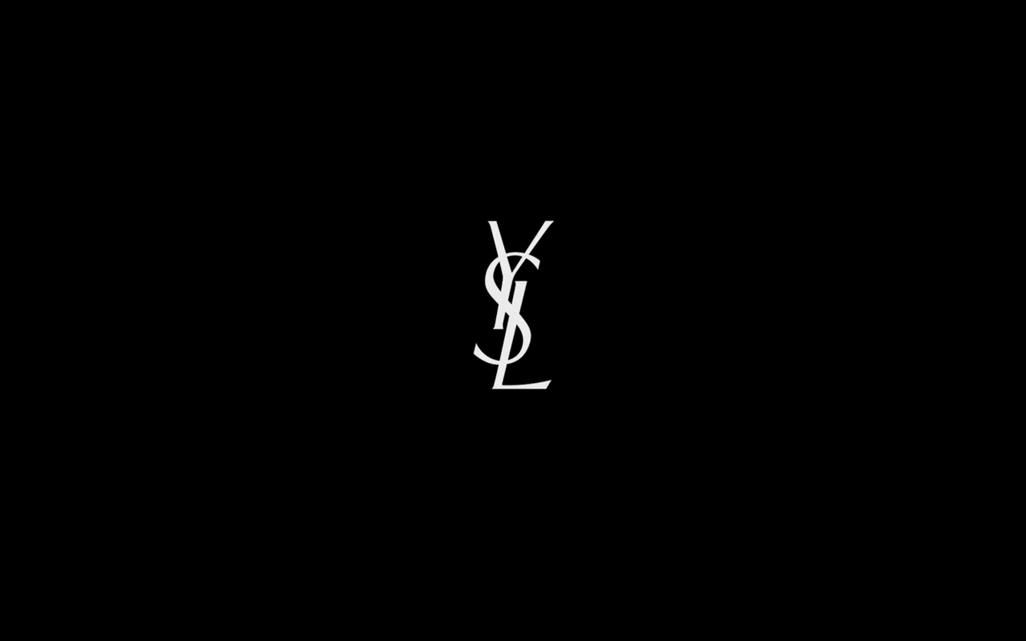 Ив сен лоран бренд. Ив сен Лоран фирменный знак. Yves Saint Laurent логотип. Ив сен Лоран значок бренда. YSL обои.